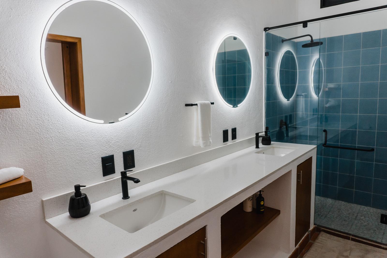 Modern double-vanity bathroom at Casa Ola Mita