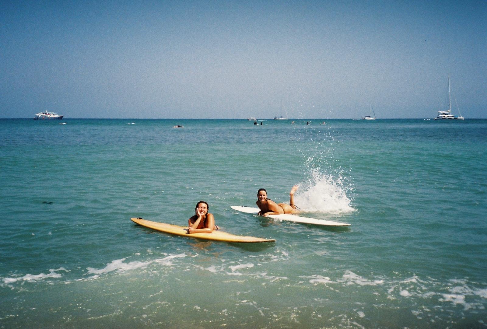 Friends surfing in Punta de Mita
